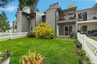 The unit's backyard off the patio