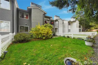 The unit's backyard off the patio