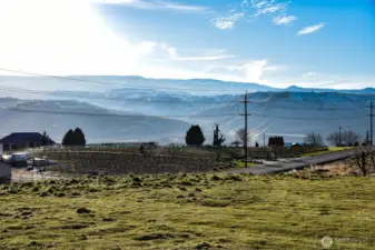 SW view over Circle 5 Winery, up the Stemilt Basin, Wenatchee Heights, and Mission Ridge!! Mission Ridge lights are fully visible on a clear night!