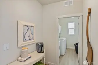 Area off of garage with lots of space. Coffee bar? Mudroom Area?