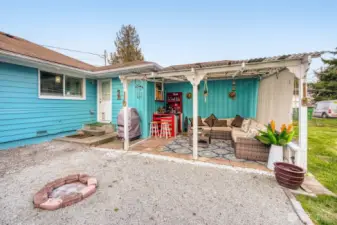 Covered entertaining space ideal for year-round relaxation.