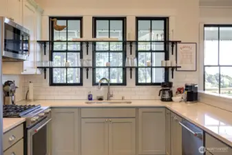 Dish duty isn't bad!  You get to take in the southern exposure and ocean and creek views.