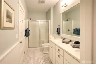 2nd Primary Bath. Double vanities with great storage and wainscotting.