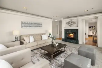 The living room is nice and roomy, with high ceilings. Keep floor plan as is, or open it up for a wow factor Great Room that takes full advantage of the view.