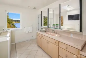 The Ensuite bathroom for the second primary suite on the upper floor. Plenty of space for dual vanities. Not shown is a walk-in shower and walk-in closet