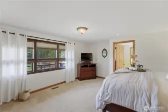 Large master has plenty of room and great views of the property.