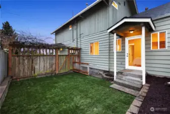 Fully fenced, private back yard with basement access