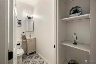 Half bath right off entry, perfect for when guests are over.