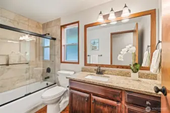 Full bathroom with updated finishes from 2020 for secondary bedrooms and guests.