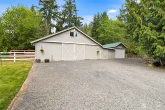 The 24x30 barn with covered paddocks offers endless potential—whether you're housing animals or building out your dream hobby space.