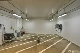 Convenient utility bay for washing and vacuuming your car.