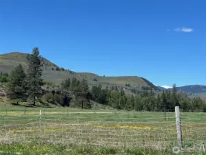 Ideal for hobby farming, with fenced areas, irrigation, and functional outbuildings.