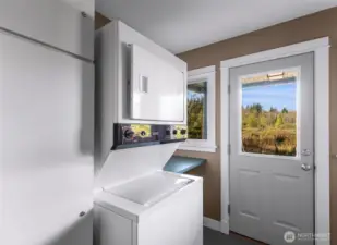 Laundry located downstairs in a shared space if being used as two units.