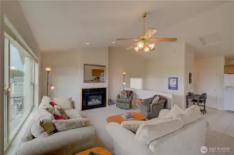 Ocean view living room with gas fireplace. This condo is fully furnished and move in ready.
