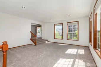 Sunken Great Room & Living area opens to dining room.