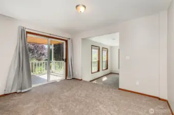 Dining room adjacent kitchen and great room. Opens to covered back porch