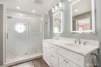 Updated shower with tile & stone accents. Quartz countertops & all new bath fixtures