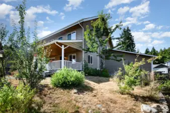 Raspberries, blueberries & plenty of garden space for your green thumb!