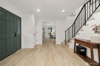 Back through the entry or left from the front door you'll find the family room