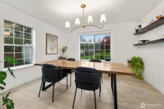 Dining room with more large windows to let in the light