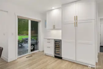 built in pantry, wine/beverage fridge and storage space