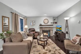 A cozy living space with a warm fireplace to gather around.