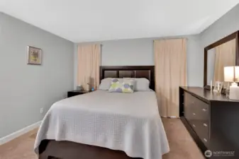 Primary bedroom has a nice neutral palette to go with any decor.