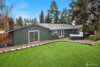 Very low maintenance backyard with turf lawn