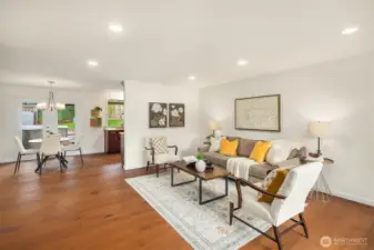 Large open entry and  living room, which flows directly into dining area, giving full sightlines to outdoor patio