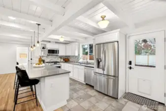 All new stainless steel appliances, quartz countertops and marble backsplash