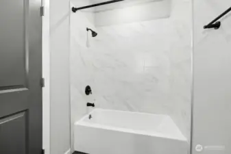 Bath tub in second primary bathroom.