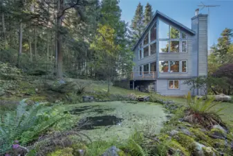 Admire the 3-tier pond from the Primary bedroom and living room...