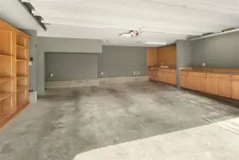 Two-car attached garage off of the alley with built-in storage.