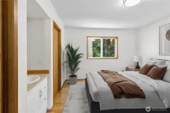 Bedroom #2 with private sink & cabinet. Virtually staged