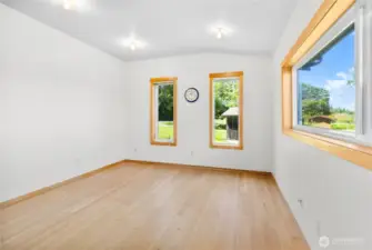 Versatile studio/office space above detached shop. Virtually staged