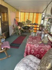 Covered back porch leading to your huge 3 car garage and or workshop