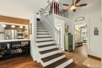 Stairs leading to Loft, Primary Bedroom, with Ensuite.