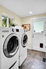 The utility room is just off of the kitchen and includes an exterior door.