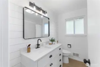 Ultra cool bathroom with shiplap accent wall