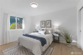 Light filled bedroom with large closet