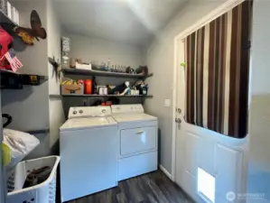 Laundry room and backdoor.