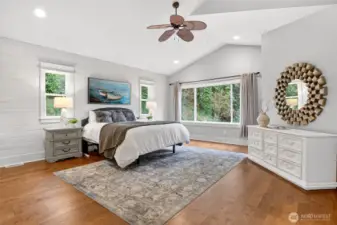 Primary suite features vaulted ceilings and lots of space