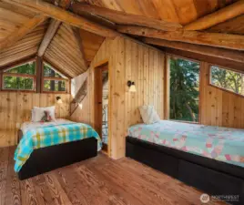 Fun loft area wih balcony.