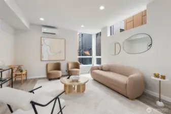 Large living room has ample space for a sectional, chairs, and entertainment center.  This picture does not do that space justice!