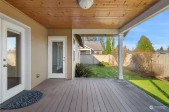 Back deck off primary and main living areas - level grass areas and side yards.