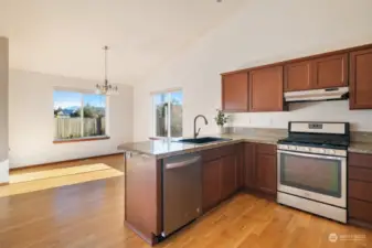 Kitchen with dining area and breakfast bar