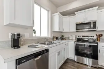 Photo is of a similar home. Colors and materials may vary.