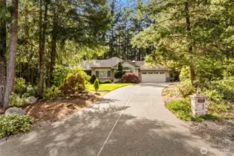 Long driveway can accomodate your vehicles, RV or boat. Driveway is not too steep.