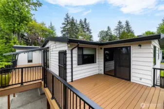 Amazing composite decks... These are really large spaces for all kinds of entertaining. Note the gate ~ you can keep pets contained in an area while you entertain !