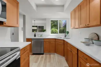 New appliances, and new counters in the super bright and cheery kitchen